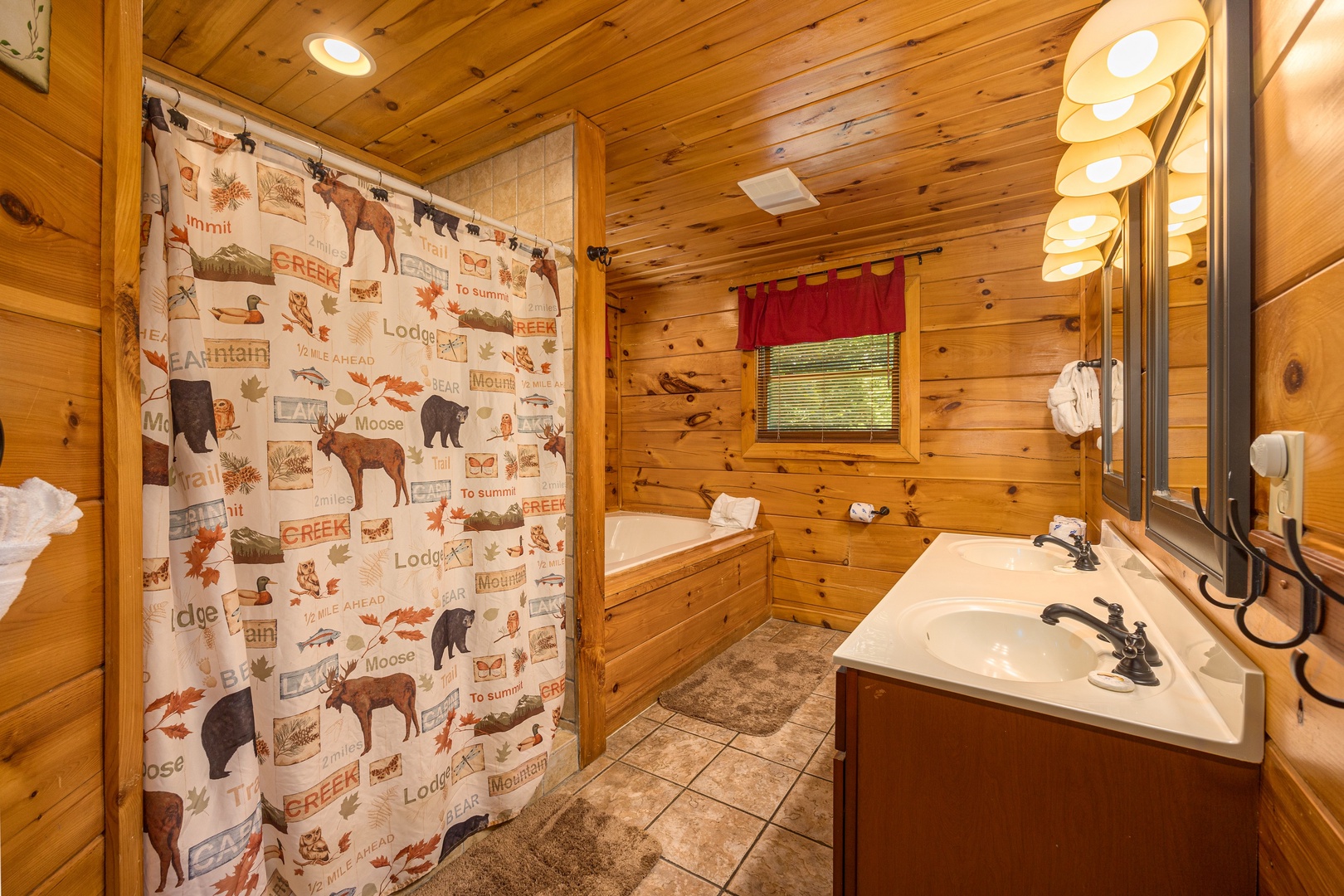 Bathroom at Moonbeams & Cabin Dreams, a 3 bedroom cabin rental located in Pigeon Forge