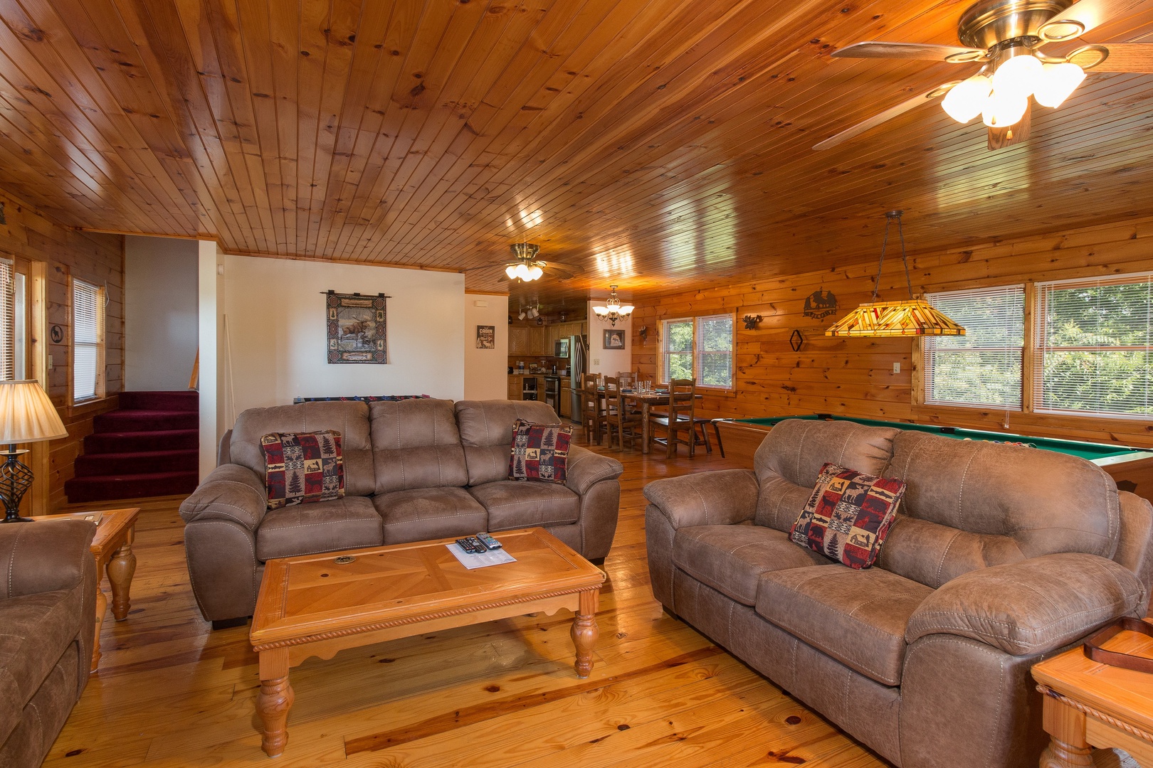 Sofa, loveseat, and chair in a living room at Moose Lodge, a 4 bedroom cabin rental located in Sevierville