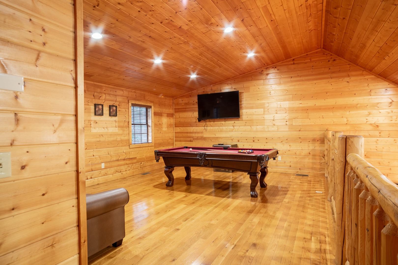 Pool Table and Flat Screen in the Loft at 3 Crazy Cubs, a 5 bedroom cabin rental located in pigeon forge
