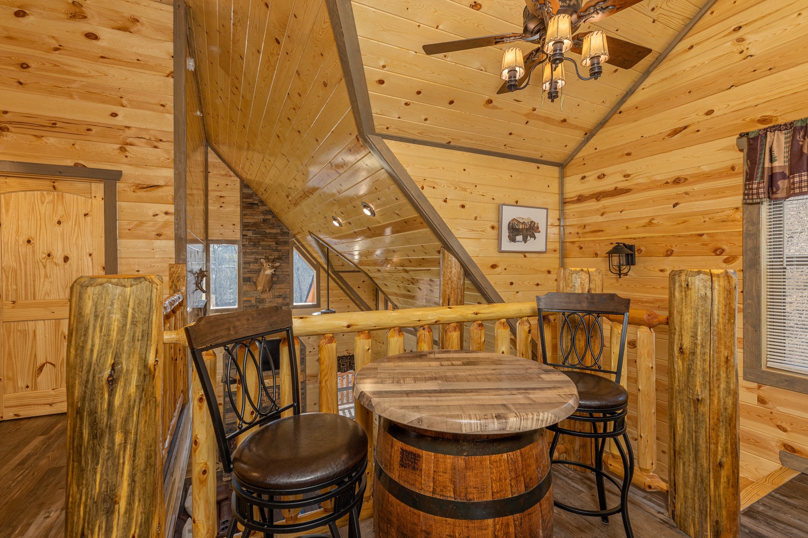 High top table in the loft at Everly's Splash, a 4 bedroom cabin rental located in Pigeon Forge