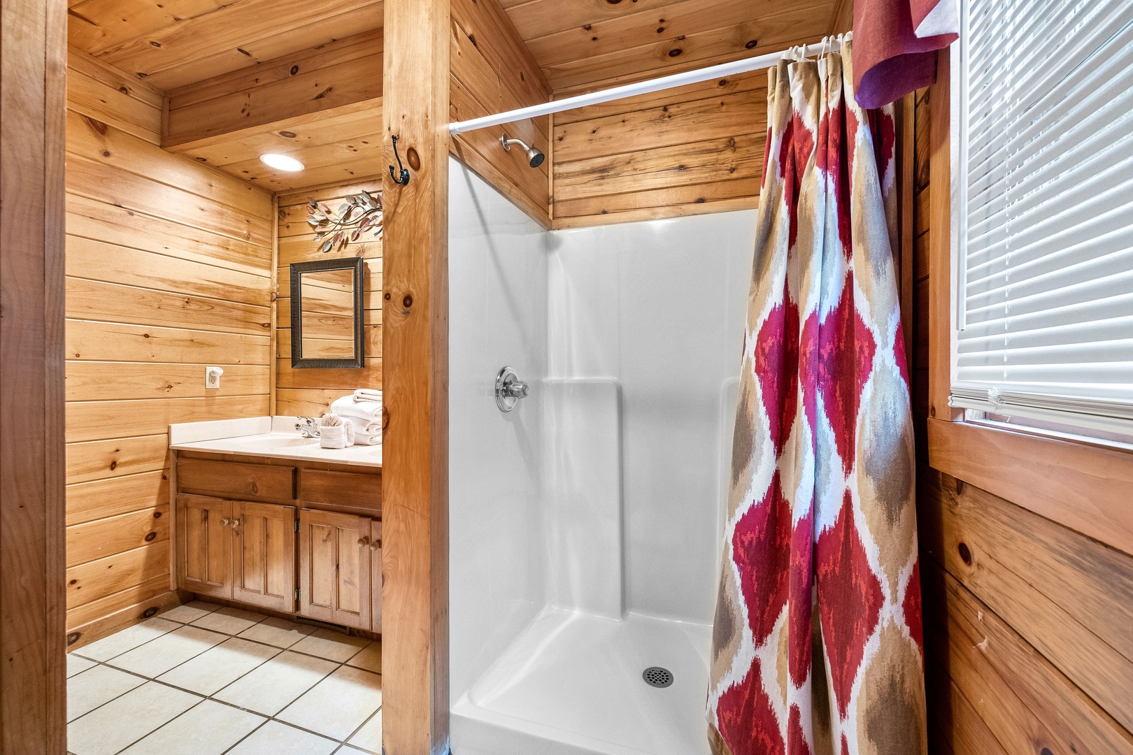 Bathroom shower at Alpine Sondance, a 2 bedroom cabin rental located in Pigeon Forge