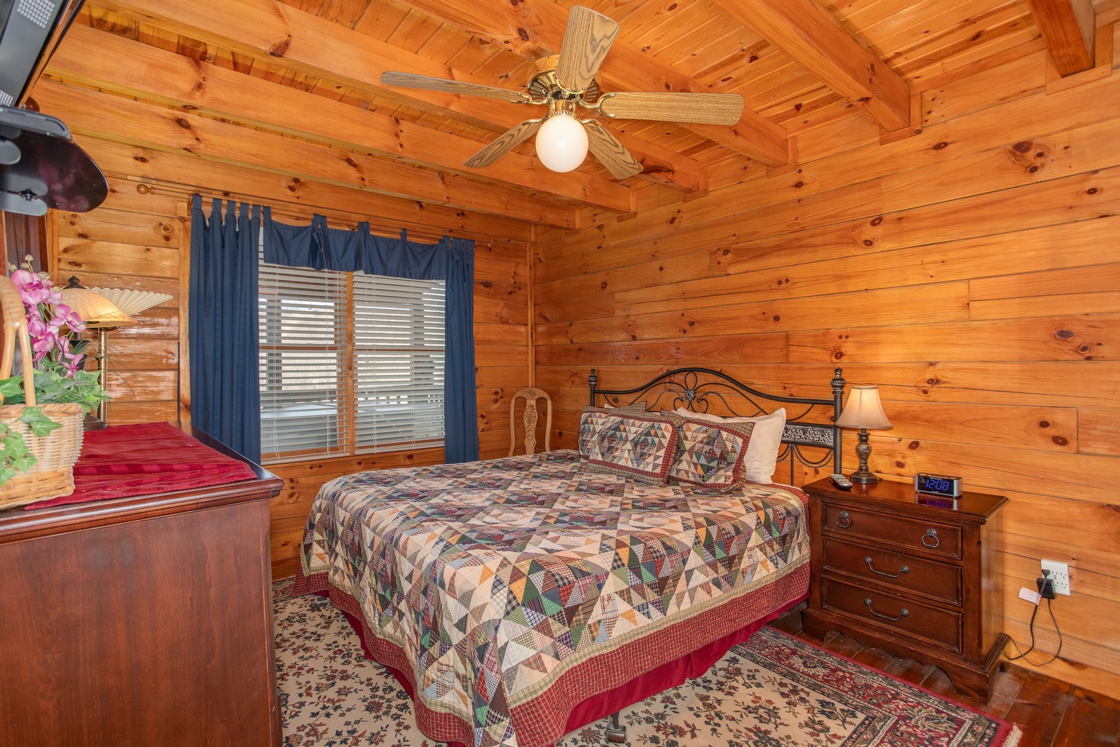 Bedroom with a king bed at Shiloh, a 3 bedroom cabin rental located in Gatlinburg