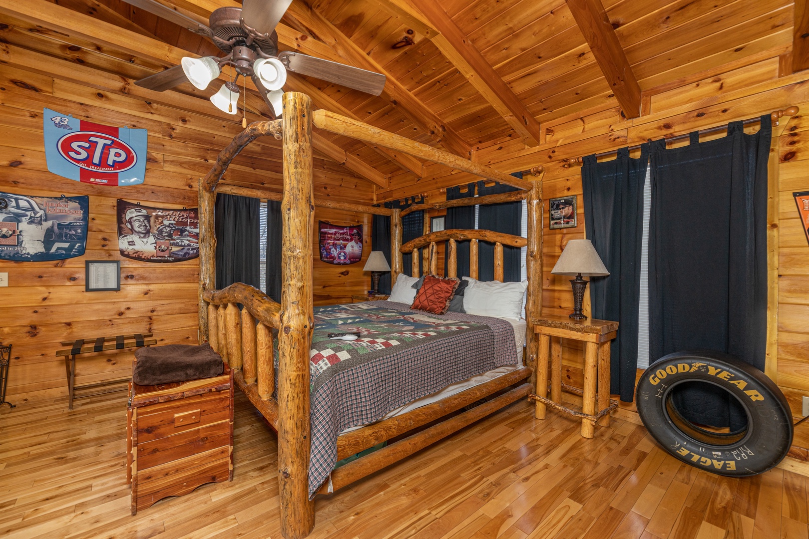 Four post bed in the loft space at Nascar Nation, a 2 bedroom cabin rental located in Pigeon Forge