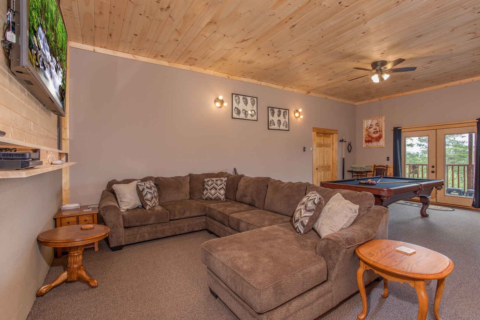 Game room with large sectional sofa and pool table at I Do Love Views, a 3 bedroom cabin rental located in Pigeon Forge