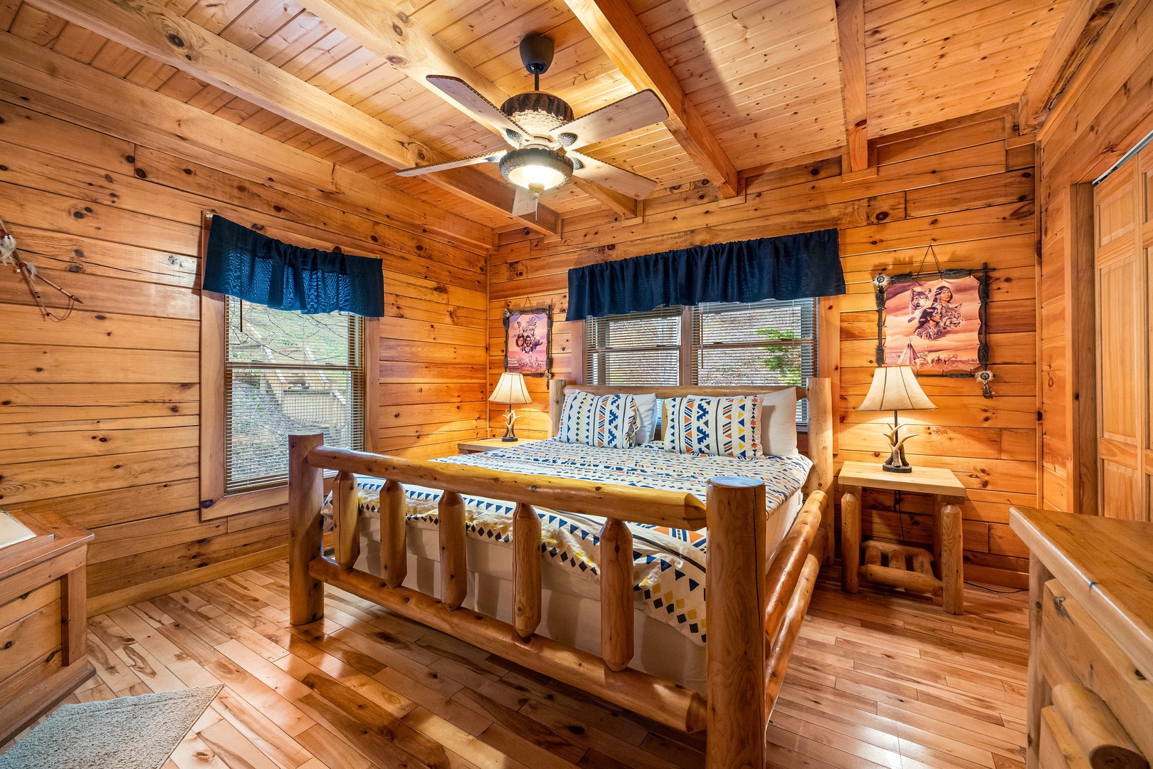 Bedroom with Log Furniture at Alpine Sondance, a 2 bedroom cabin rental located in Pigeon Forge