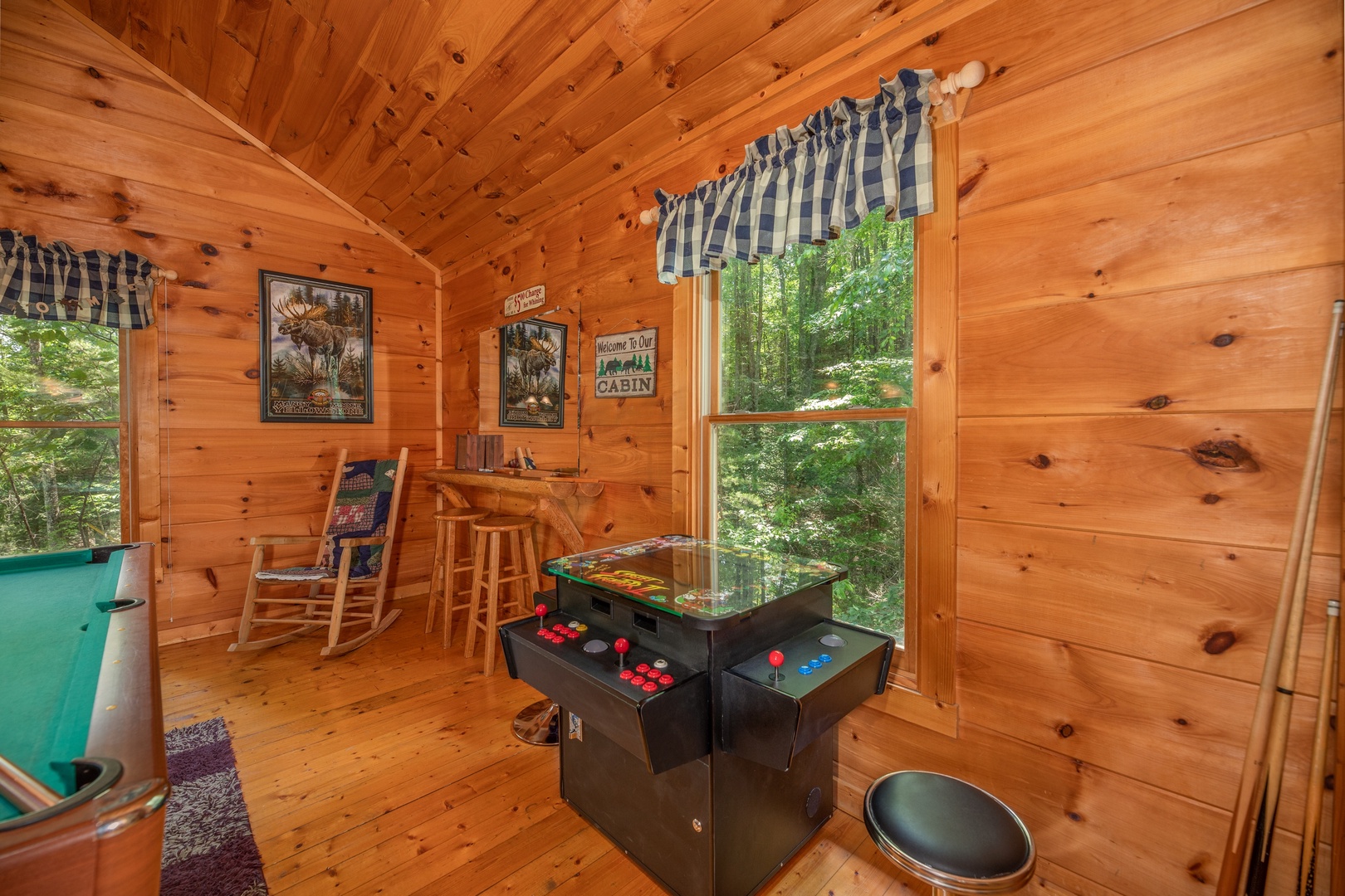 Arcade game in the game loft at Misty Mountain Escape, a 2 bedroom cabin rental located in Gatlinburg