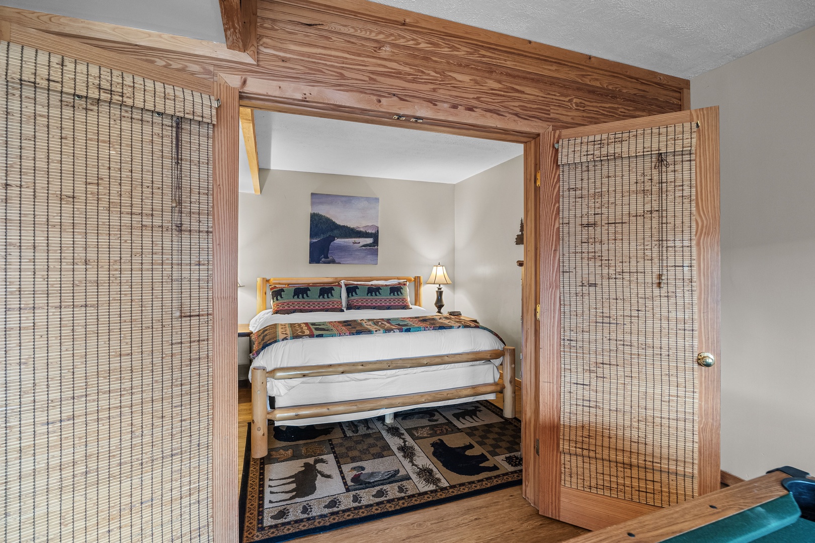 Main floor bedroom at Brink of Heaven, a 2 bedroom cabin rental located in Gatlinburg