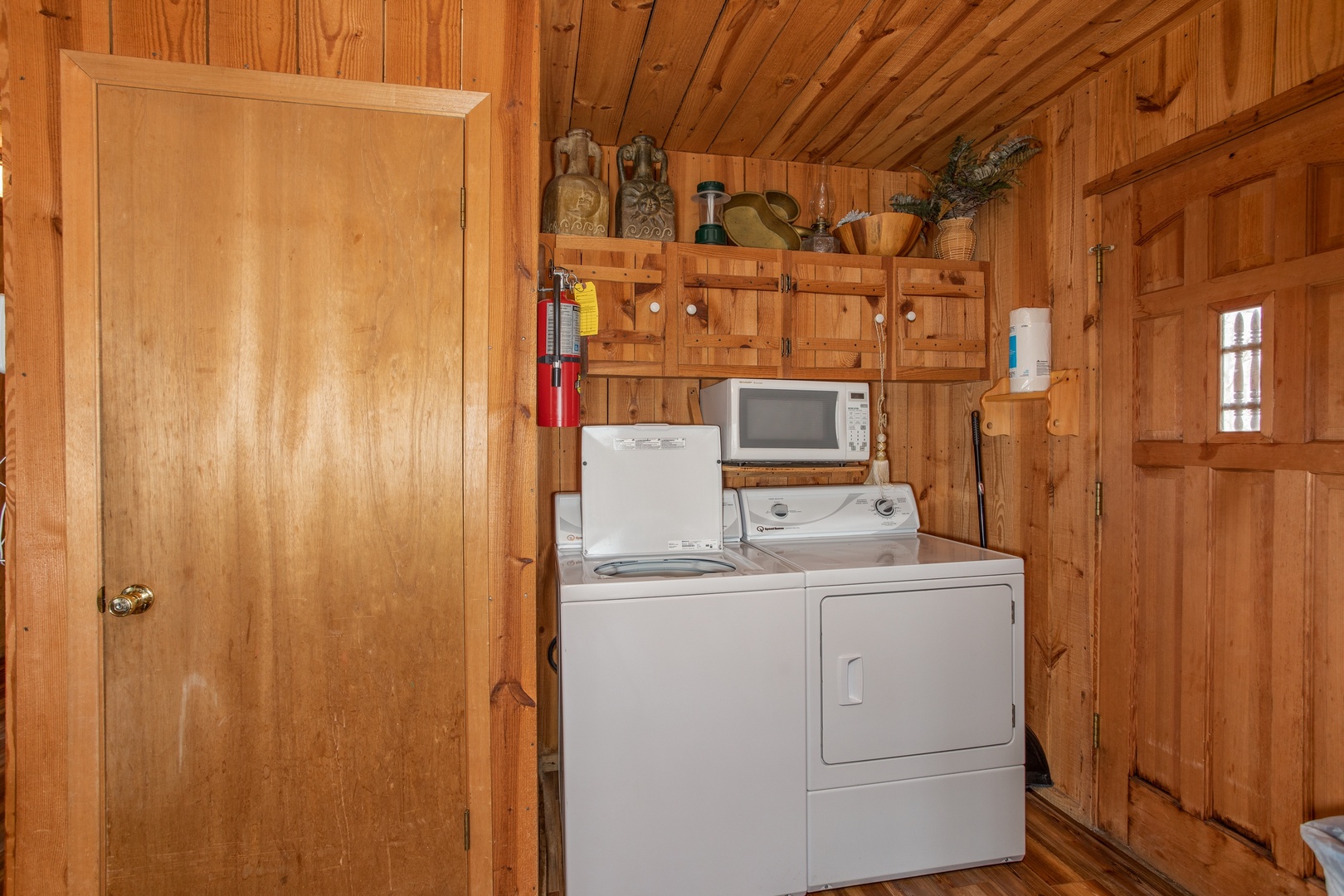 Laundry space and a microwave at Papa Bear, a 3 bedroom cabin in Pigeon Forge