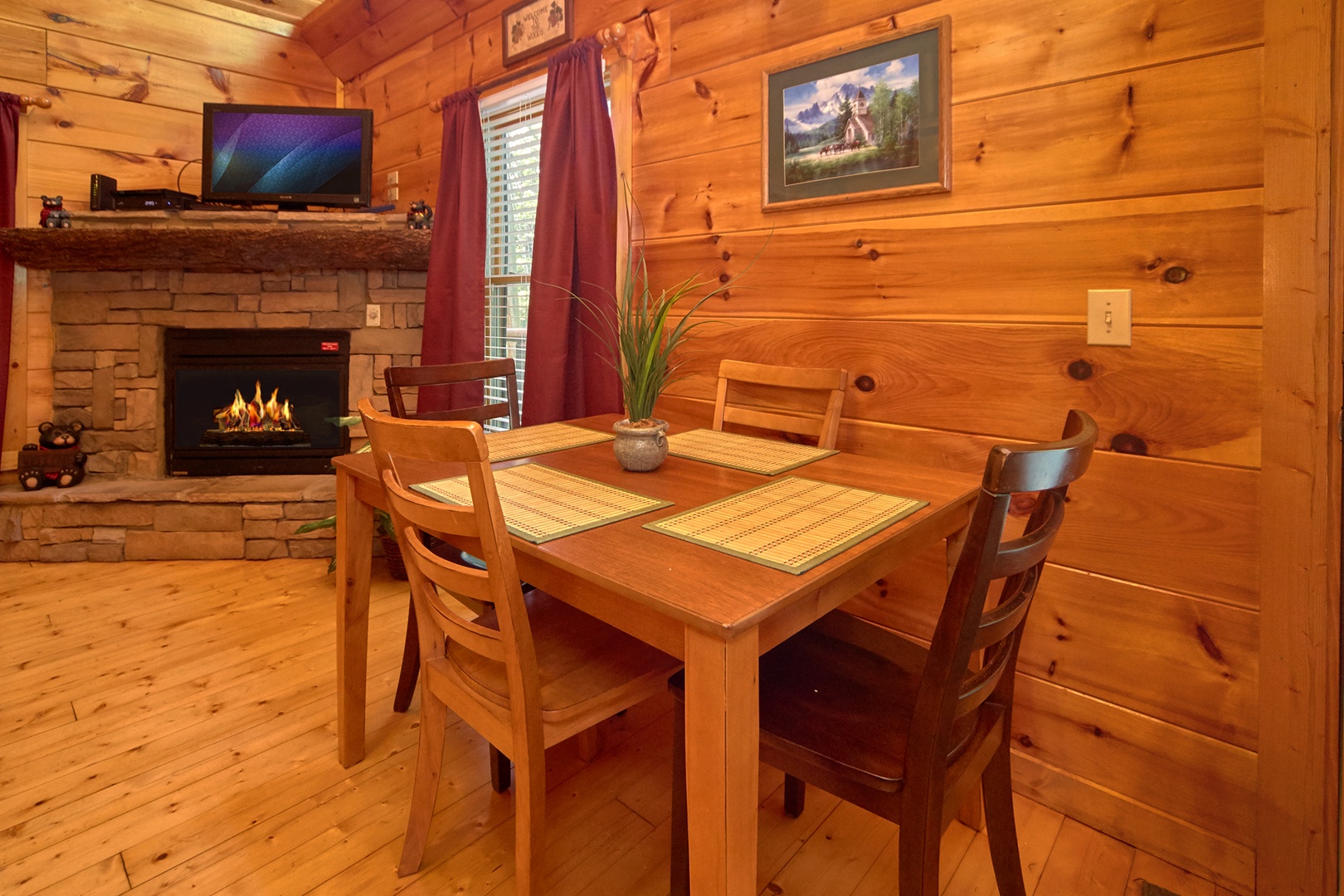 Dining table for four at Love Struck, a 1 bedroom cabin rental located in Pigeon Forge