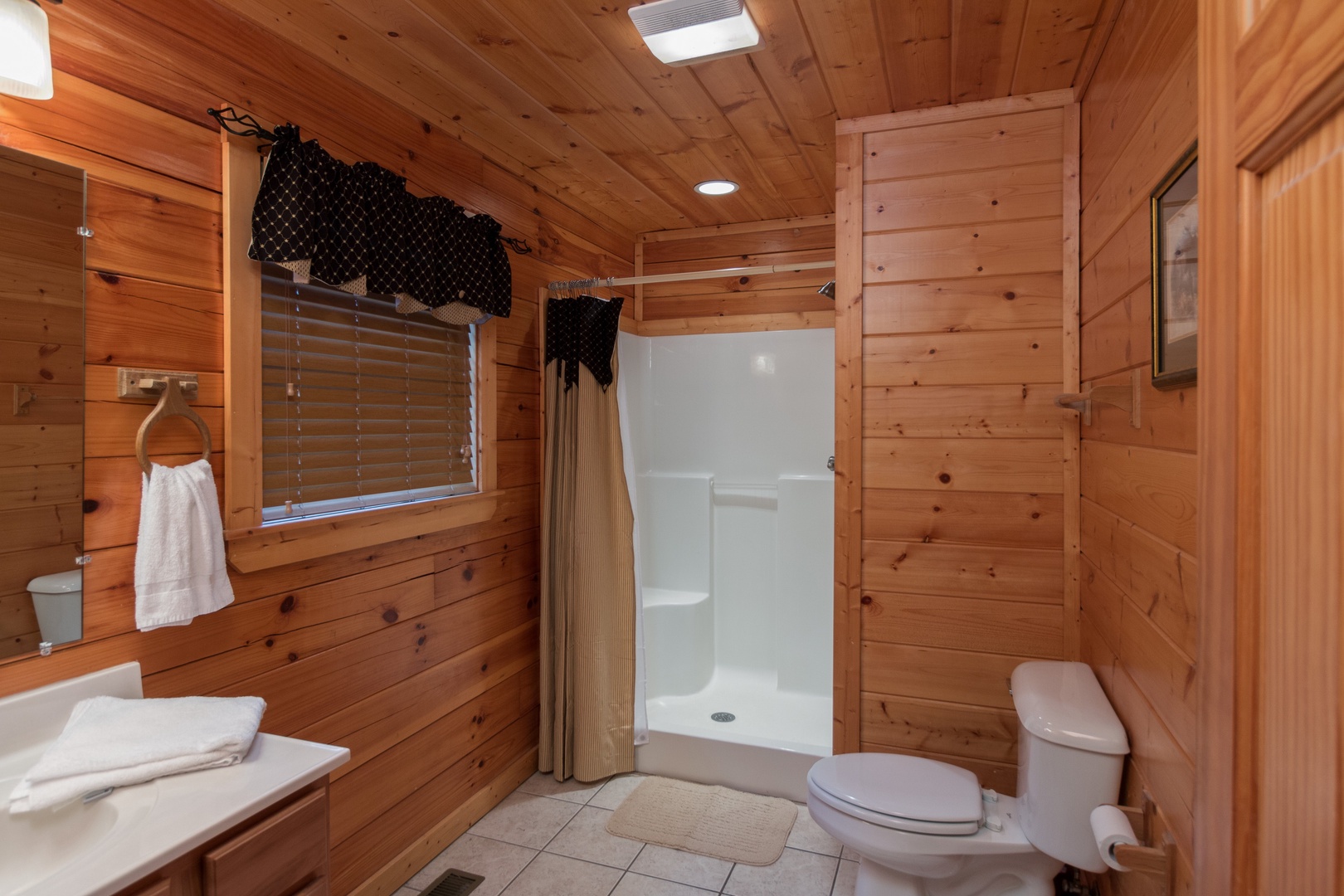 Bathroom with shower at Family Ties Lodge