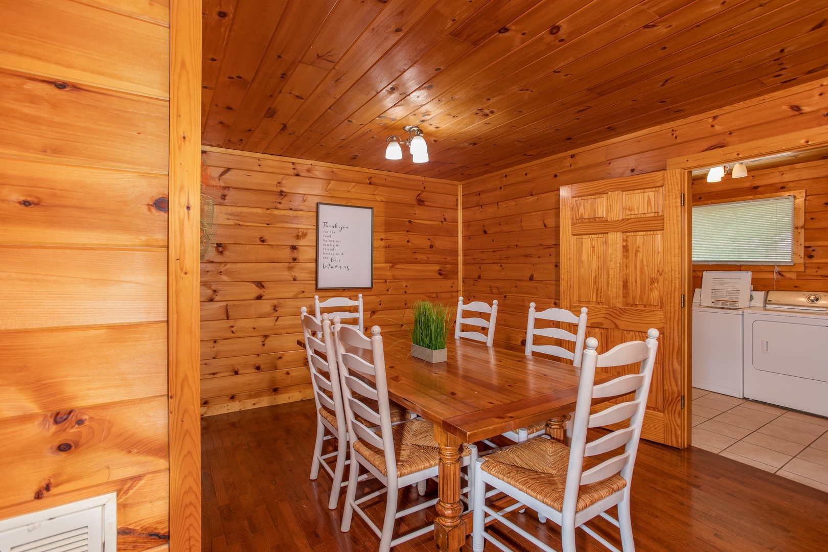 Dining space with seating for six at Cabin Fever, a 4-bedroom cabin rental located in Pigeon Forge