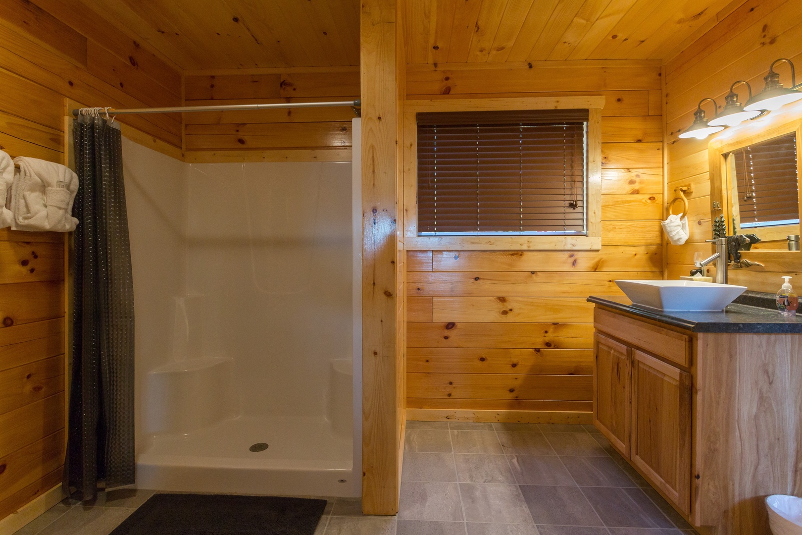 Bathroom with a shower at Canyon Camp Falls, a 2 bedroom cabin rental located in Pigeon Forge