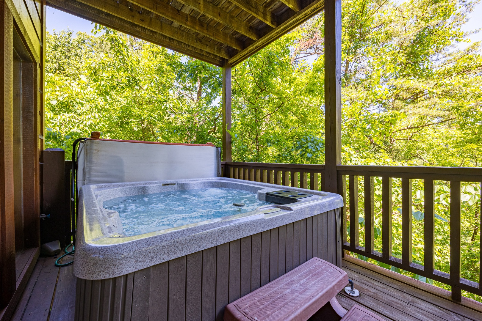 Hot tub at Moonbeams & Cabin Dreams, a 3 bedroom cabin rental located in Pigeon Forge
