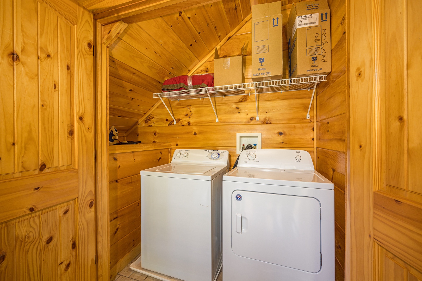 Washer and dryer at Moonbeams & Cabin Dreams, a 3 bedroom cabin rental located in Pigeon Forge