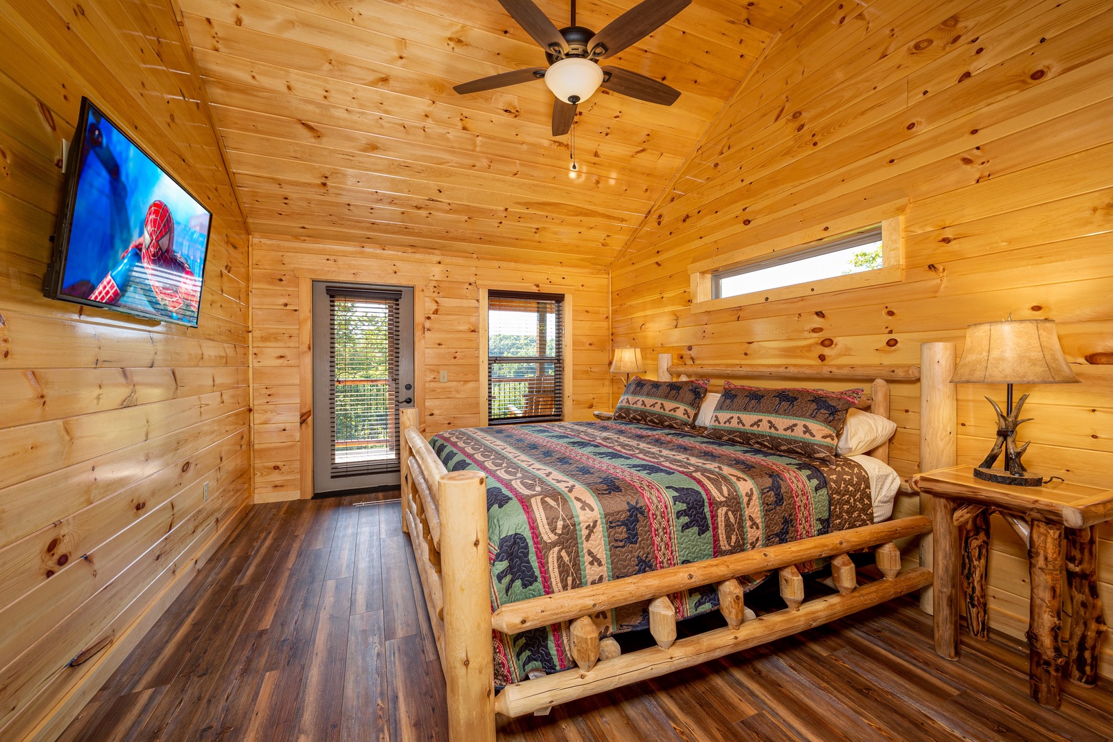 Bedroom with Deck Entry at Make A Splash, a 2 bedroom cabin rental located in gatlinburg