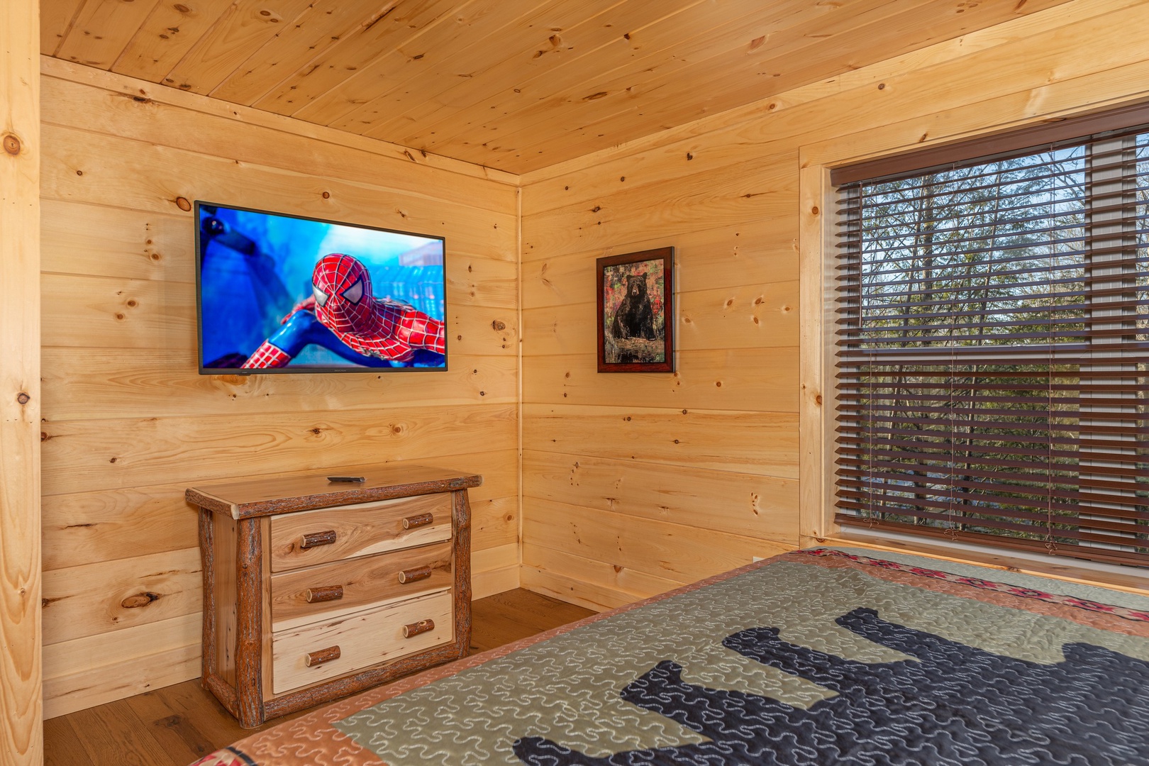 Dresser and TV in a bedroom at Bessy Bears Cabin, a 2 bedroom cabin rental located inGatlinburg
