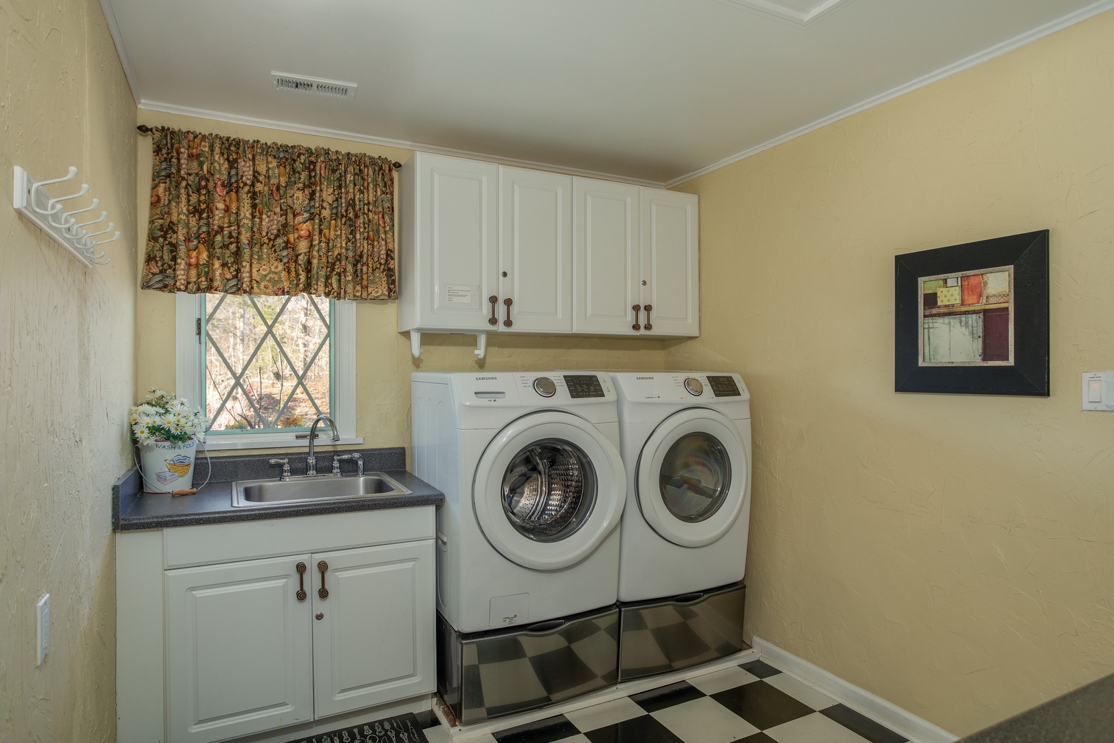 Laundry room with utility sink at Best View Ever! A 5 bedroom cabin rental in Pigeon Forge
