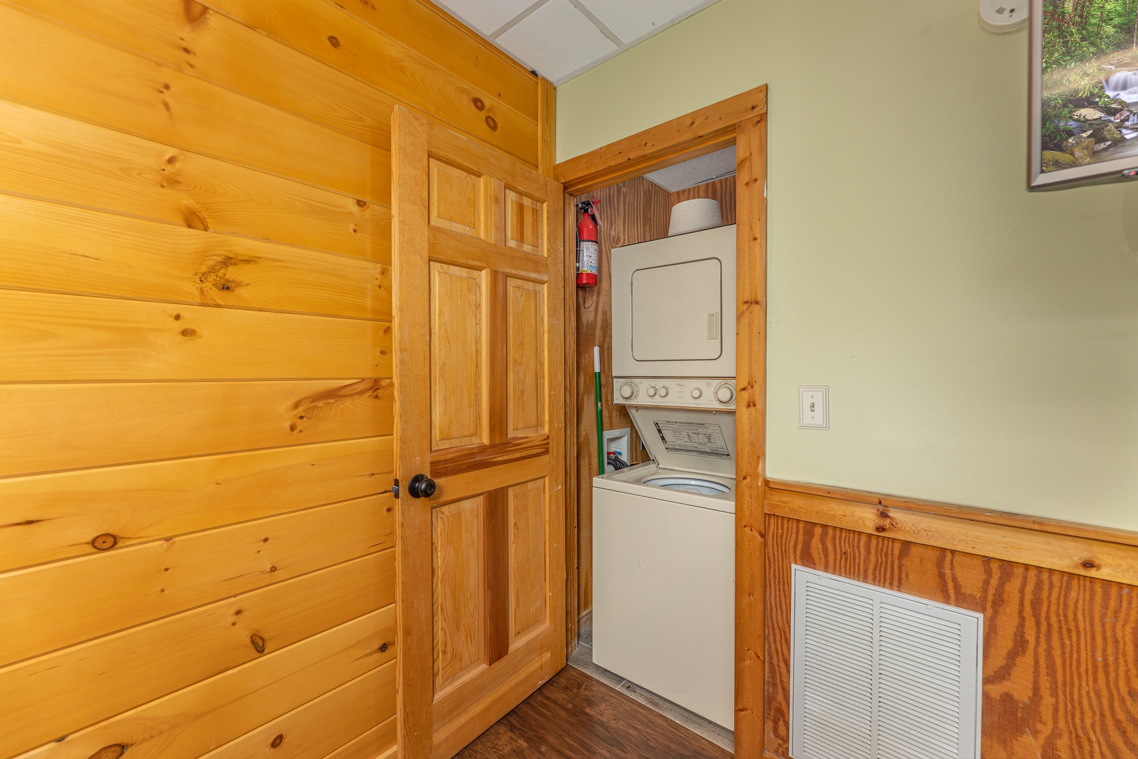 Stacked washer and dryer at Southern Charm, a 2 bedroom cabin rental located in Pigeon Forge