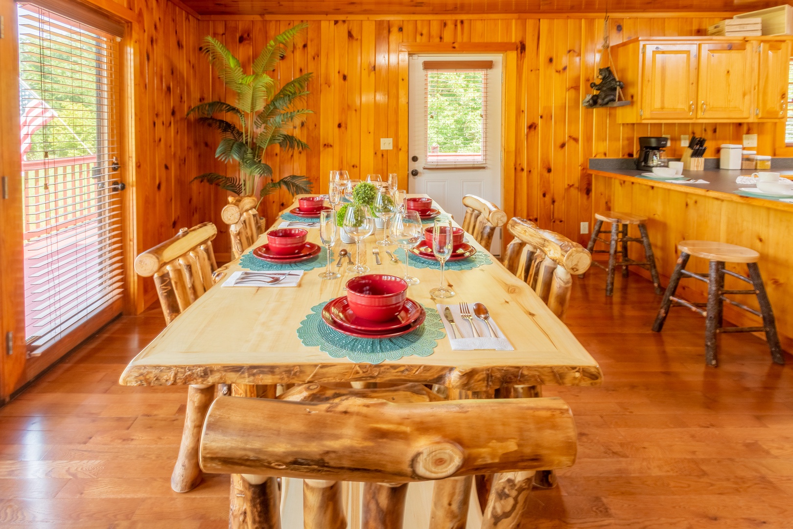 Log dining table for 6 at 1 Crazy Cub, a 4 bedroom cabin rental located in Pigeon Forge