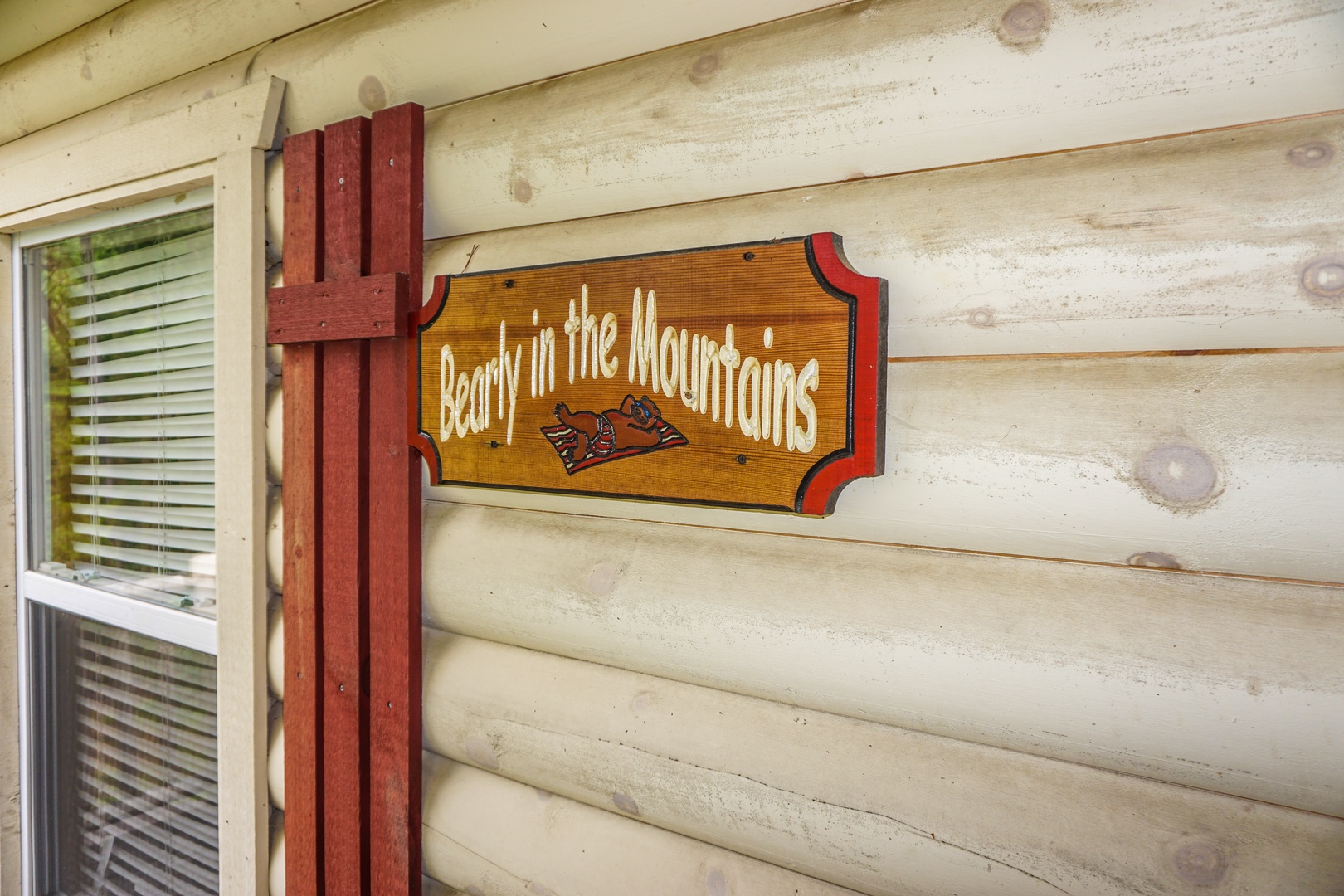 Custom welcome sign at Bearly in the Mountains, a 5-bedroom cabin rental located in Pigeon Forge
