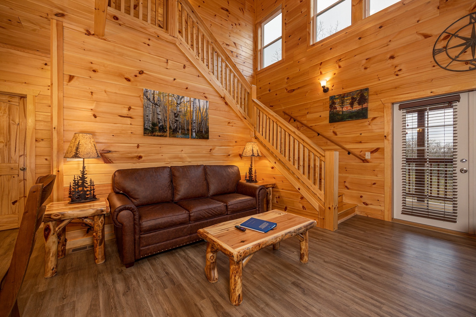 Living room seating at Mountain Pool & Paradise, a 3 bedroom cabin rental located in Pigeon Forge