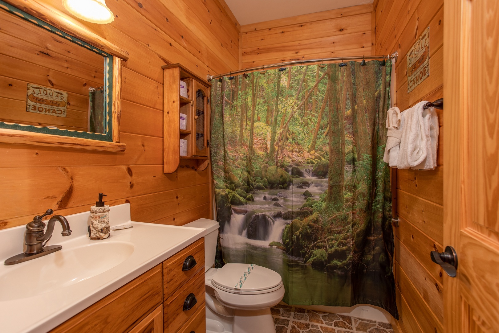 Bathroom with a tub and shower at Great View Lodge, a 5-bedroom cabin rental located in Pigeon Forge