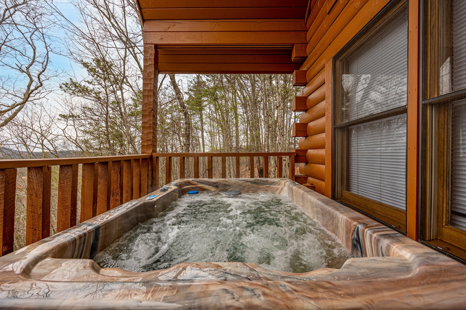 Hot tub at Cupids Crossing, a 1 bedroom cabin rental located in Pigeon Forge