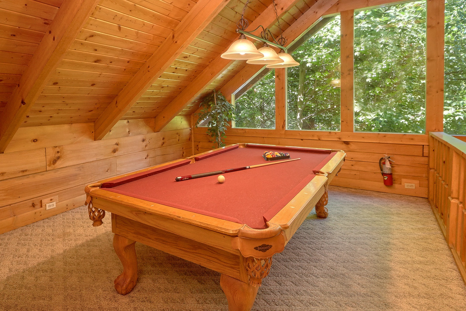 Pool table in a lofted space at A Place to Remember, a 2 bedroom cabin rental located in Gatlinburg