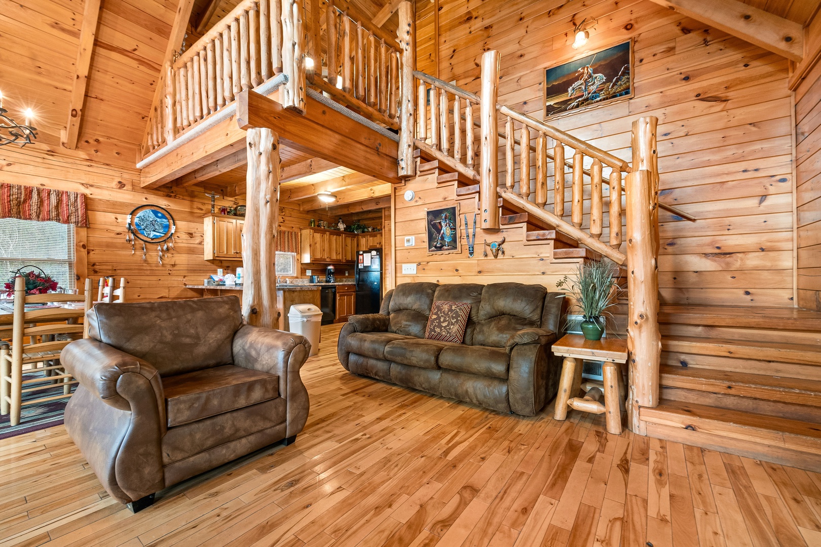 Sofa and chair in the living room at Alpine Sondance, a 2 bedroom cabin rental located in Pigeon Forge