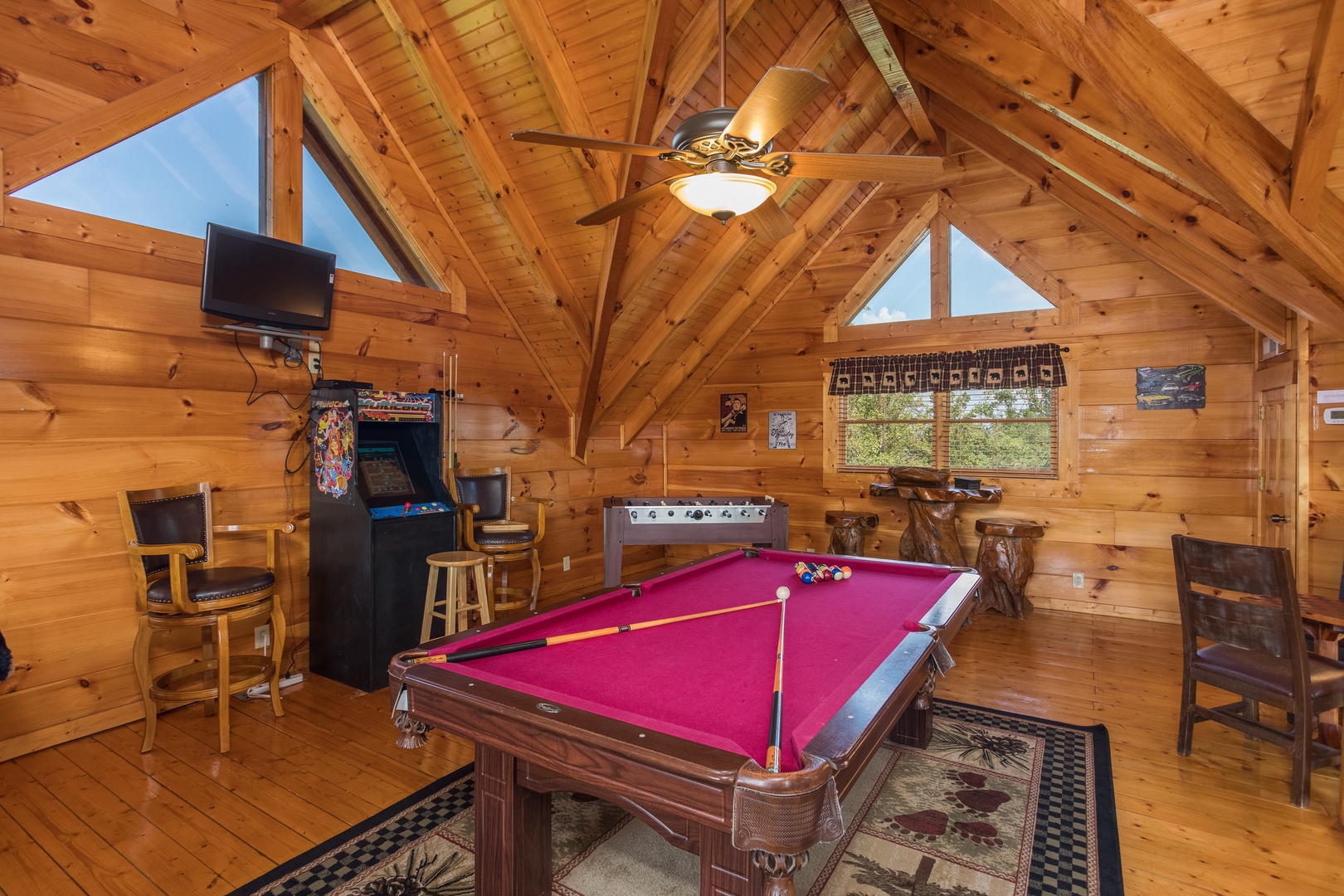 Pool table in the game loft at Graceland, a 4-bedroom cabin rental located in Pigeon Forge