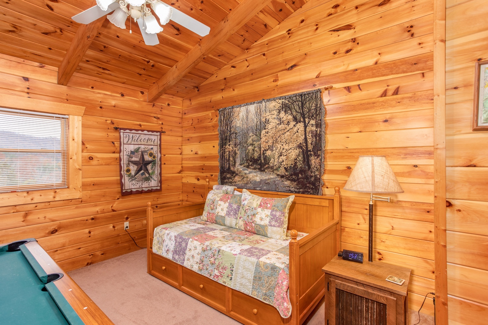 Trundle bed in the loft space at Enchanted Evening, a 1-bedroom cabin rental located in Pigeon Forge