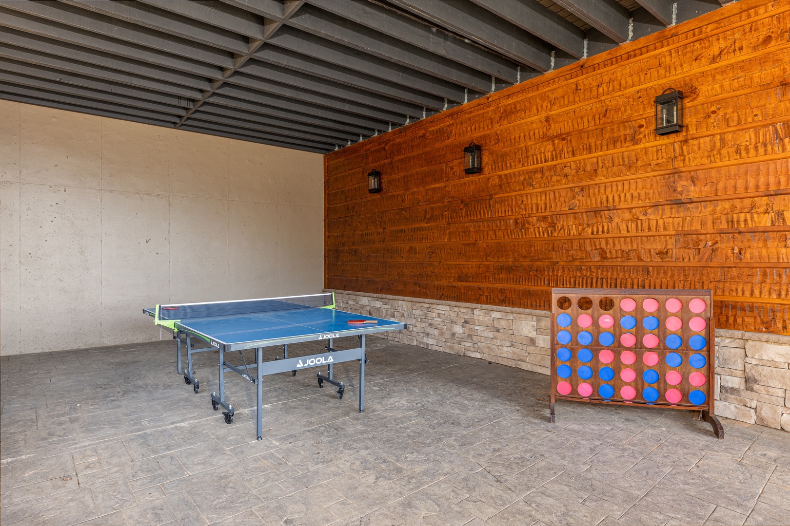 Ping pong and connect four at black bears & biscuits lodge a 6 bedroom cabin rental located in pigeon forge