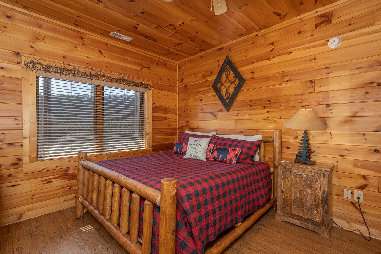 King Bed at Mountain Mama, a 3 bedroom cabin rental located in pigeon forge
