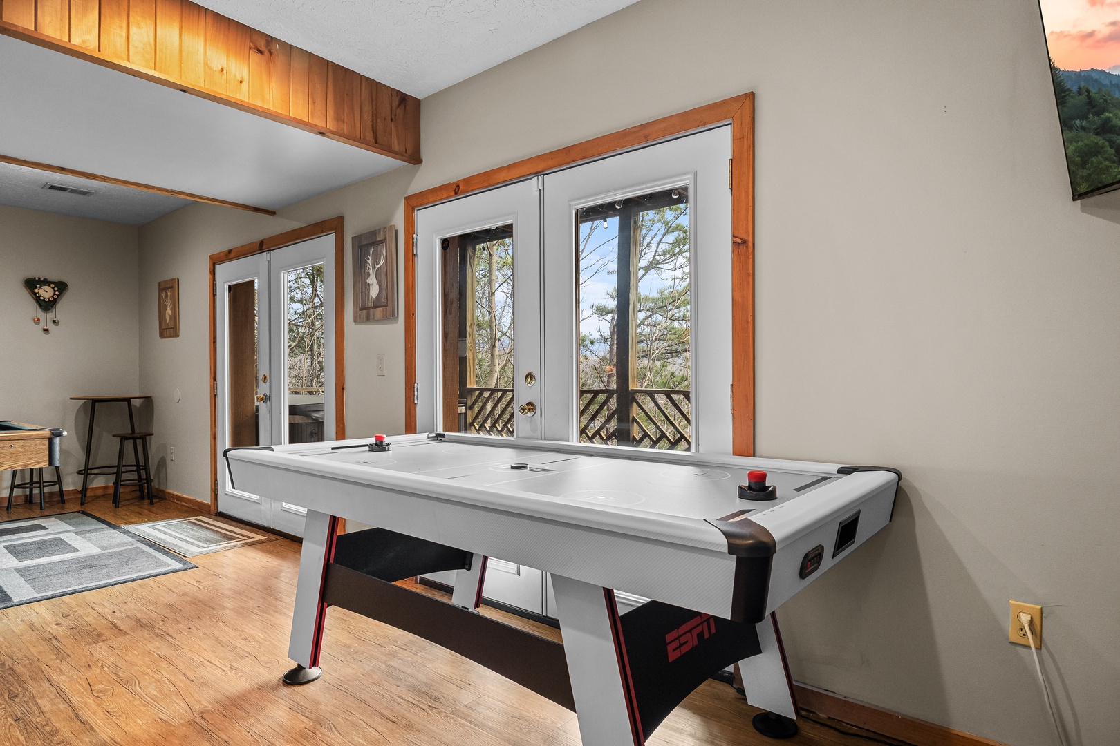 Air hockey table at Brink of Heaven, a 2 bedroom cabin rental located in Gatlinburg
