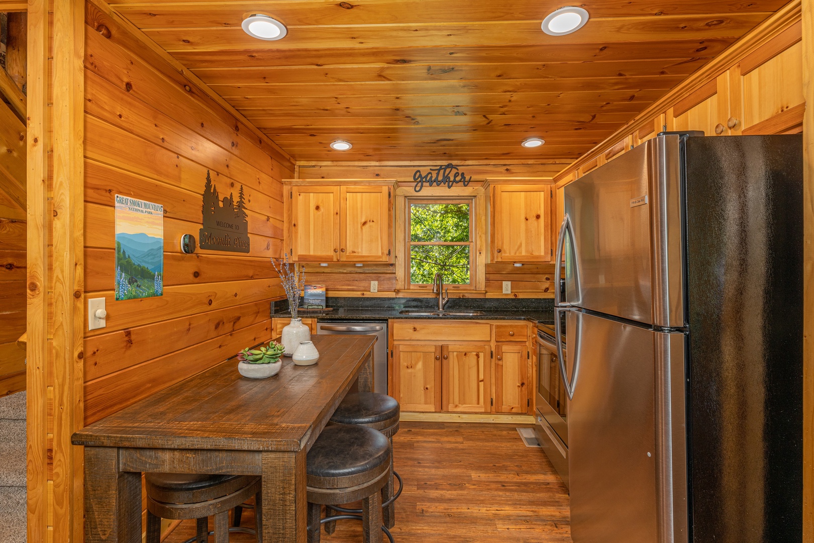 Dining table in the kitchen at Moonlit Pines, a 2 bedroom cabin rental located in Pigeon Forge