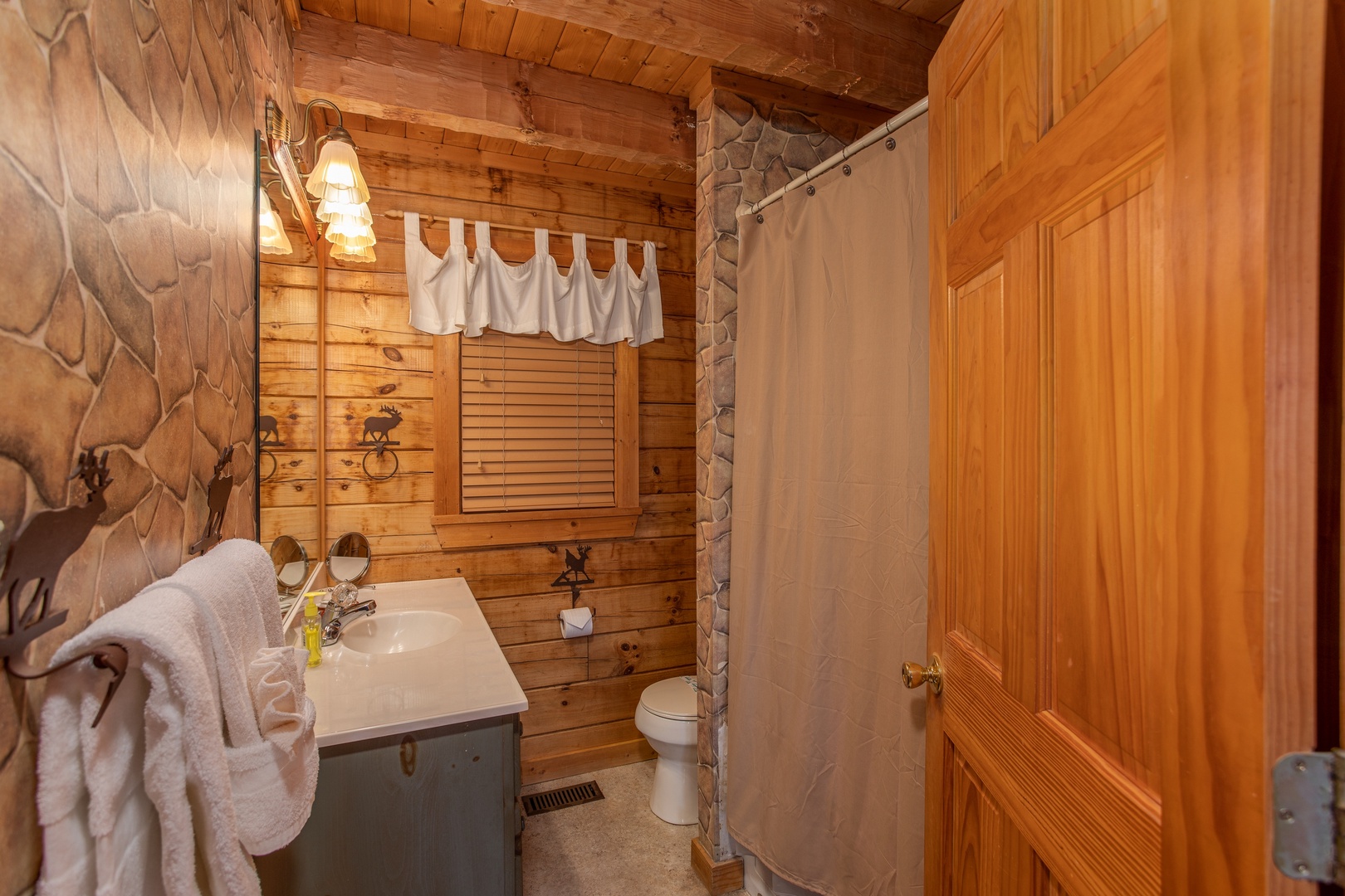 Bathroom at Cabin in the Clouds, a 3-bedroom cabin rental located in Pigeon Forge