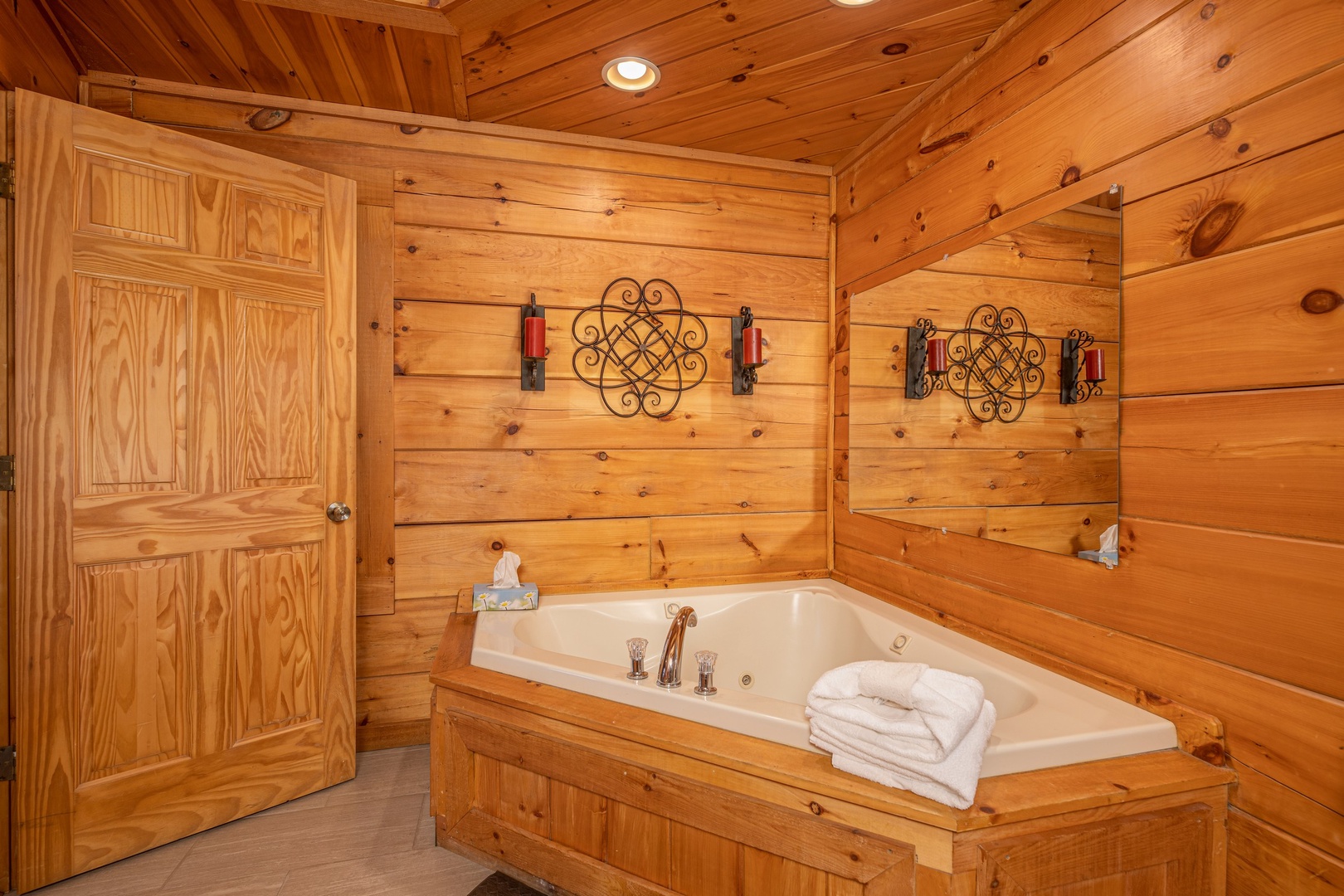 Jacuzzi in a corner at Livin' Simple, a 2 bedroom cabin rental located in Pigeon Forge