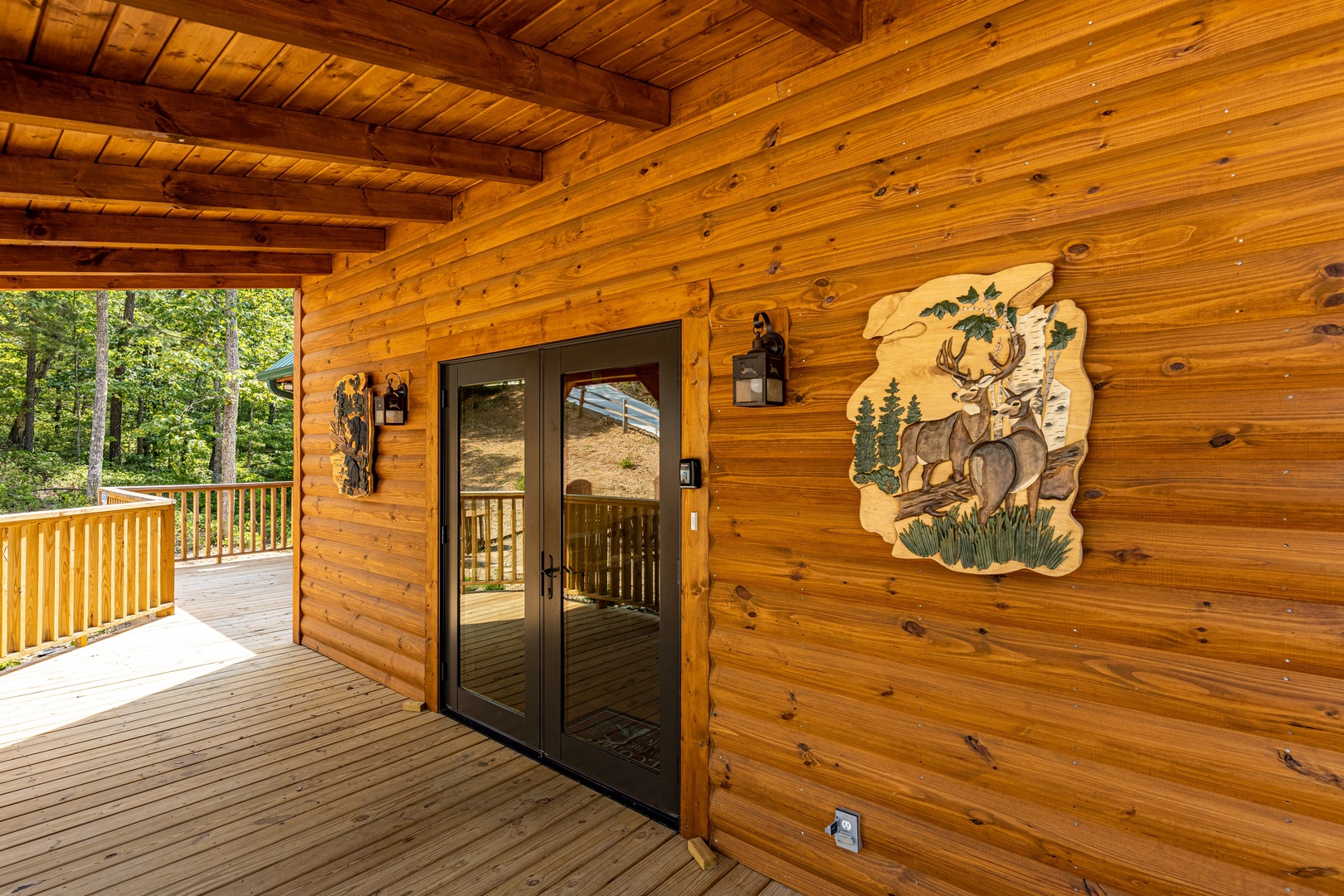 Deck access at J's Hideaway, a 4 bedroom cabin rental located in Pigeon Forge
