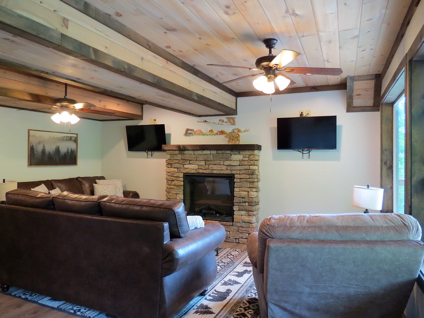 Flat Screen TV and Fireplace at Cozy Bear
