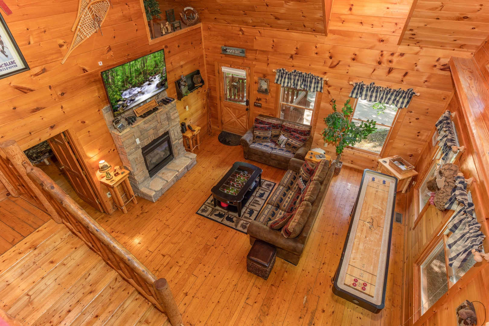 Looking down into the living room at Misty Mountain Escape, a 2 bedroom cabin rental located in Gatlinburg