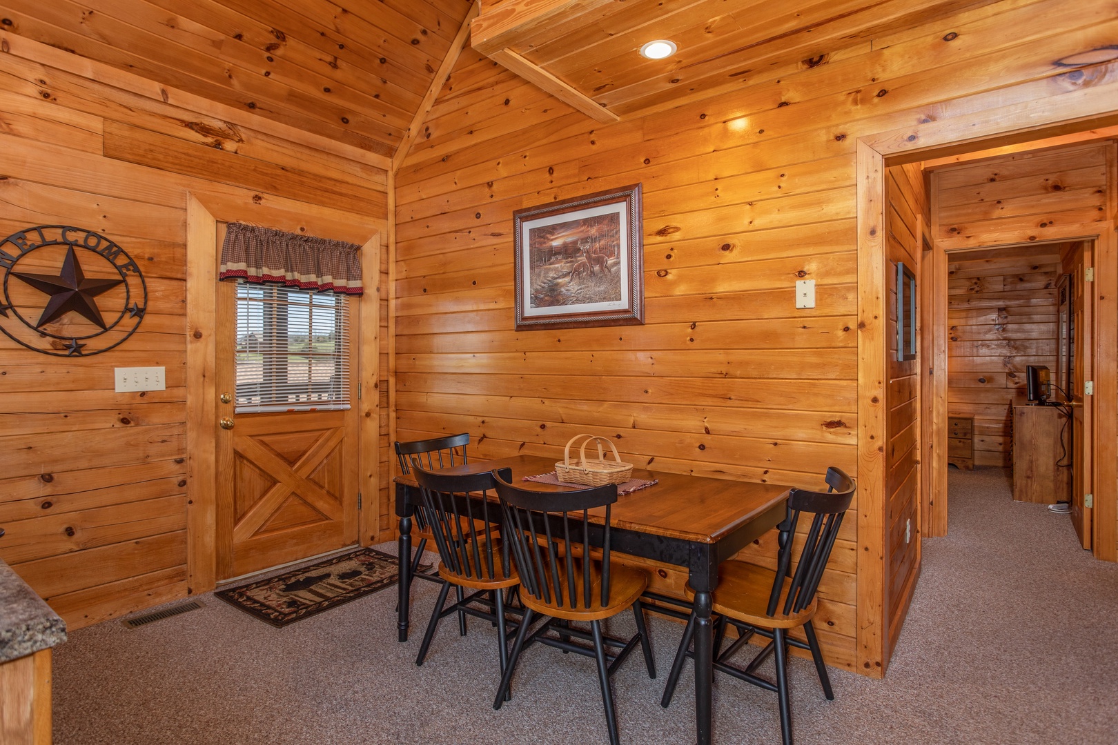 Dining table for four at Momma Bear, a 2 bedroom cabin rental located in Pigeon Forge