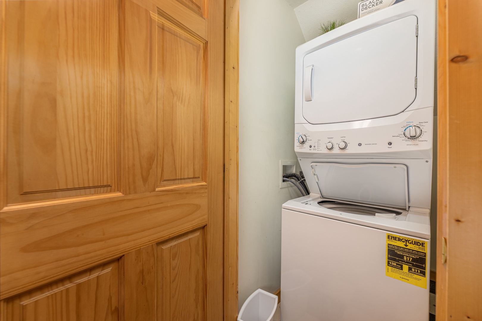 Stacked washer and dryer at Cub's Crossing, a 3 bedroom cabin rental located in Gatlinburg