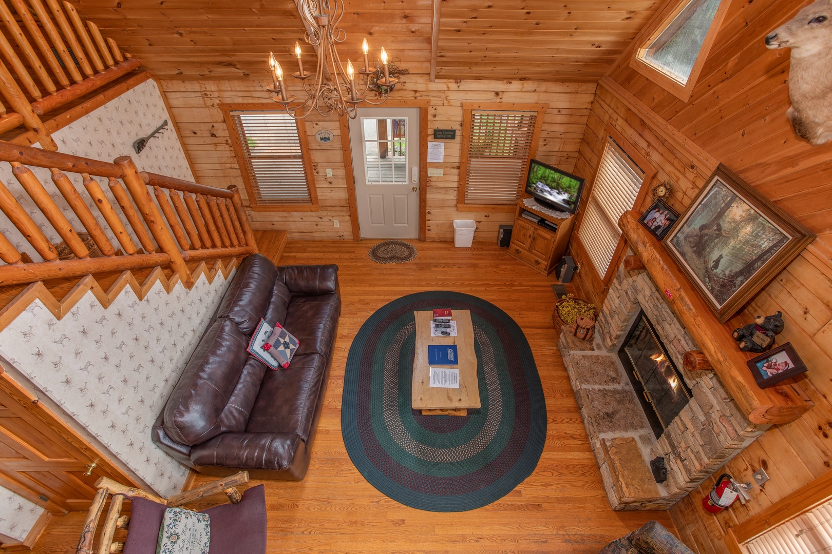 Looking down into the living room at Cabin in the Clouds, a 3-bedroom cabin rental located in Pigeon Forge