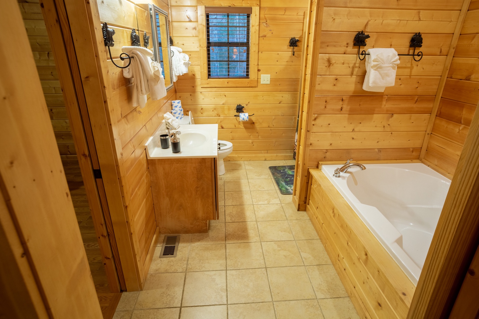 Bathroom at 3 Crazy Cubs, a 5 bedroom cabin rental located in pigeon forge