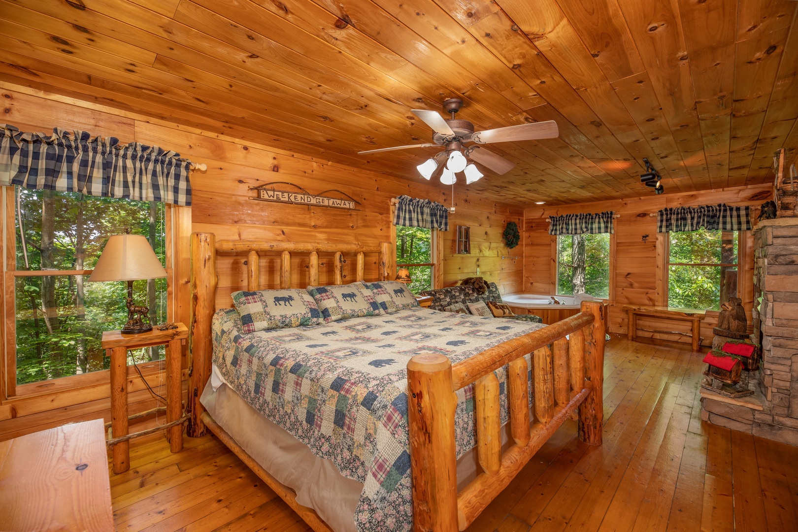 Bedroom with a king log bed at Misty Mountain Escape, a 2 bedroom cabin rental located in Gatlinburg
