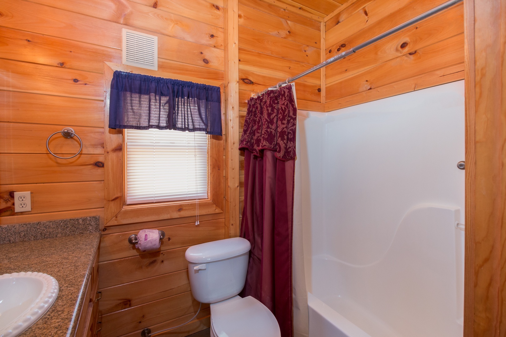 Bathroom with a tub and shower at Ella-Vation, a 3 bedroom cabin rental located in Gatlinburg