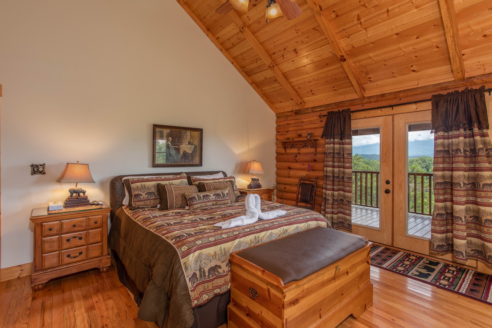 Bedroom with deck access at I Do Love Views, a 3 bedroom cabin rental located in Pigeon Forge