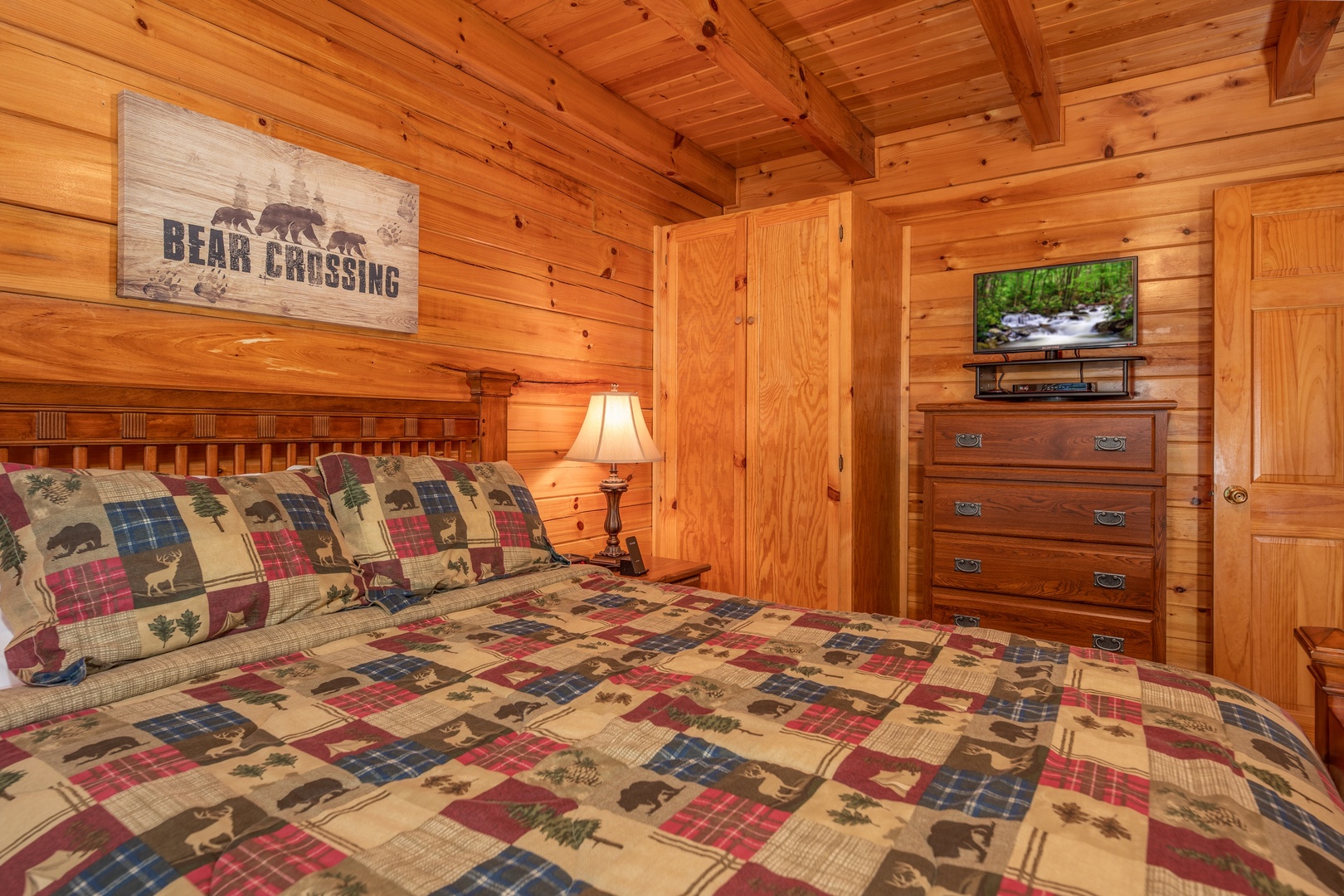 Dresser and TV in the second bedroom at Grand View, a 3 bedroom cabin rental located in Sevierville