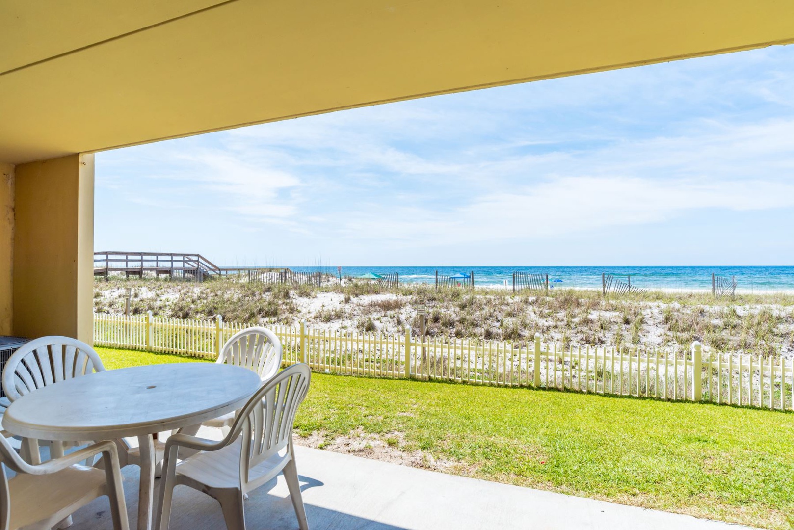 Ocean Breeze West Unit 104 Patio and Great View Of Beach