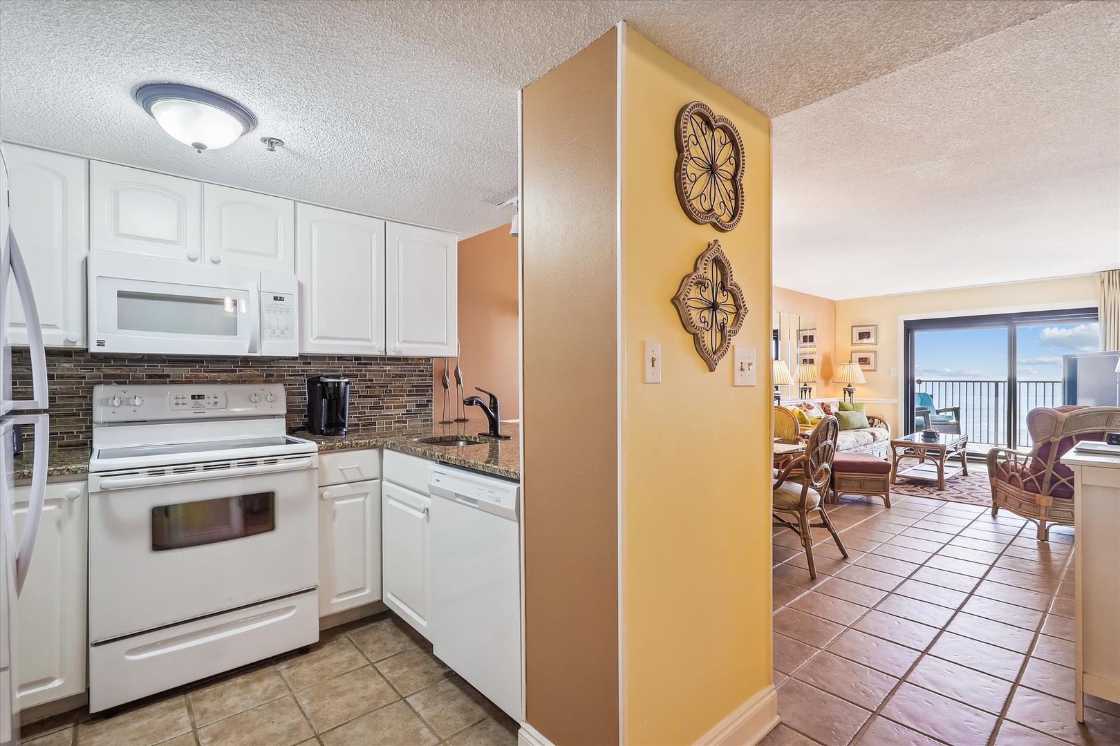 Ocean Breeze East 402 Kitchen and Dining Room